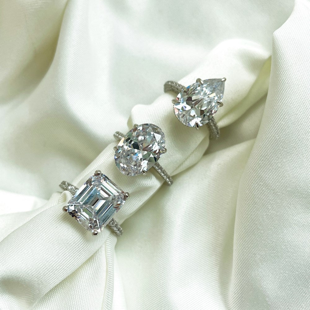 Silver Zircon Pear Cut Inlaid Wrapped Solitaire Ring