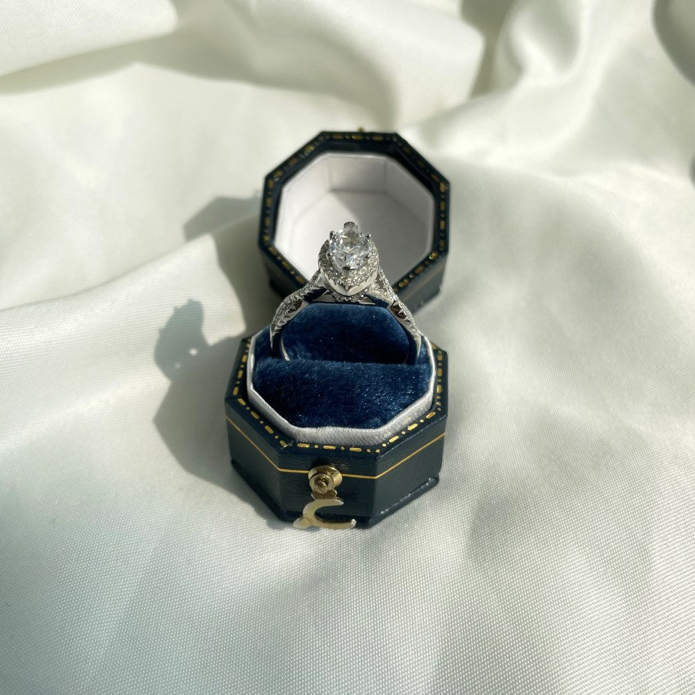 Silver Zircon Marquise Cut Iced Twisted Halo Ring