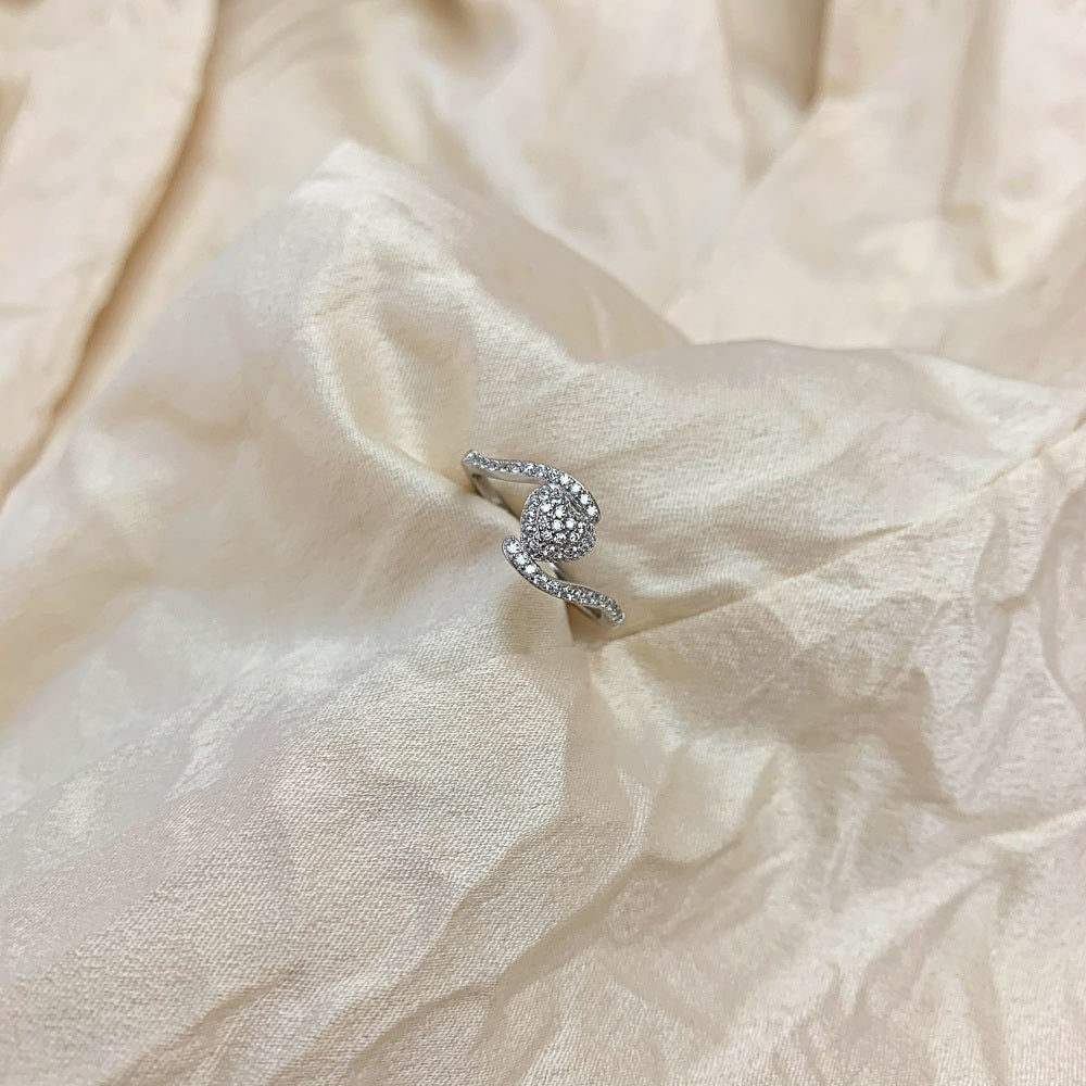 Silver Zircon Round Cut Twisted Iced Heart Bypass Ring