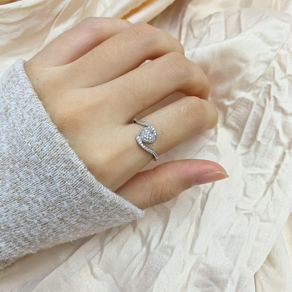 Silver Zircon Round Cut Twisted Iced Heart Bypass Ring