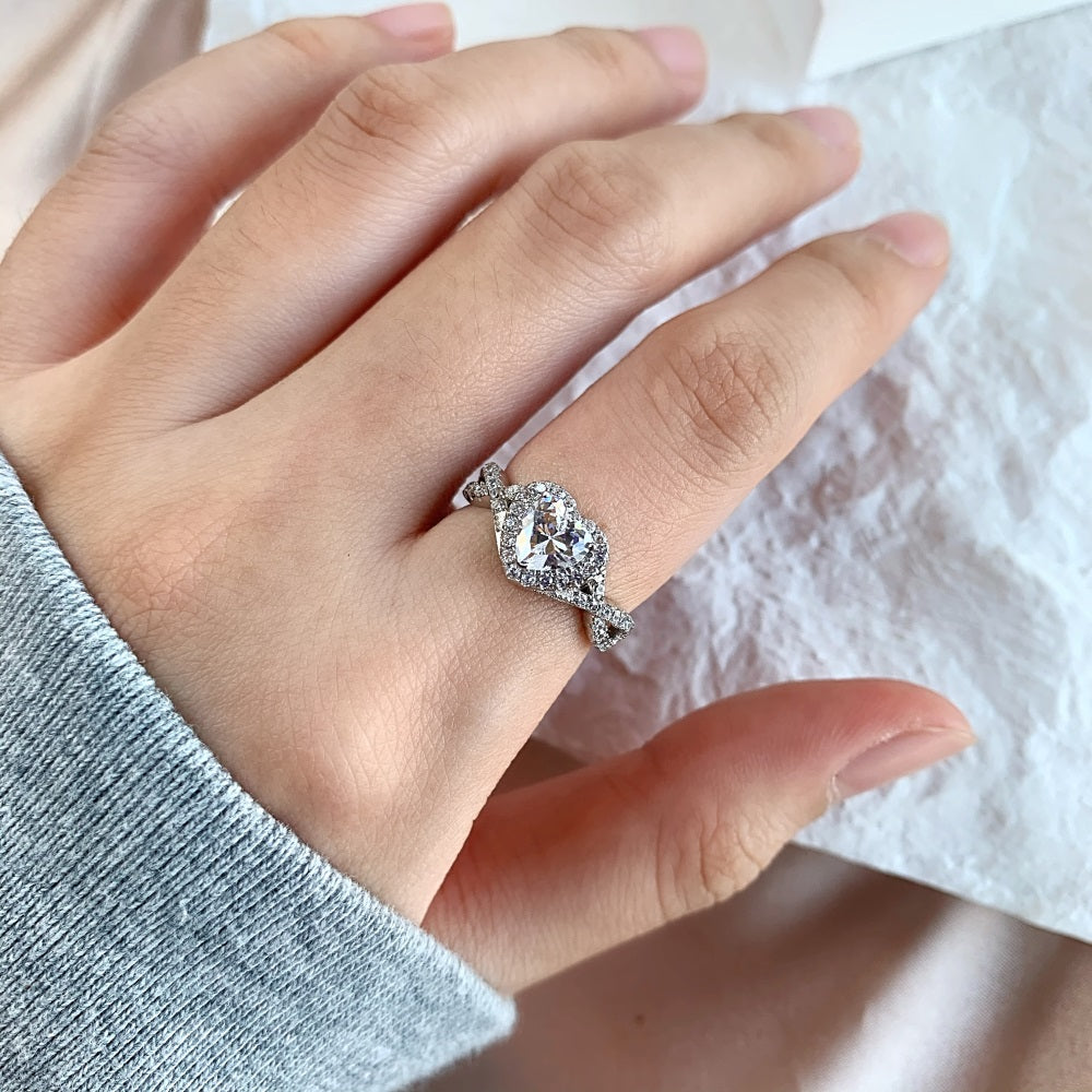 Silver Zircon Heart Cut Iced Twisted Halo Ring