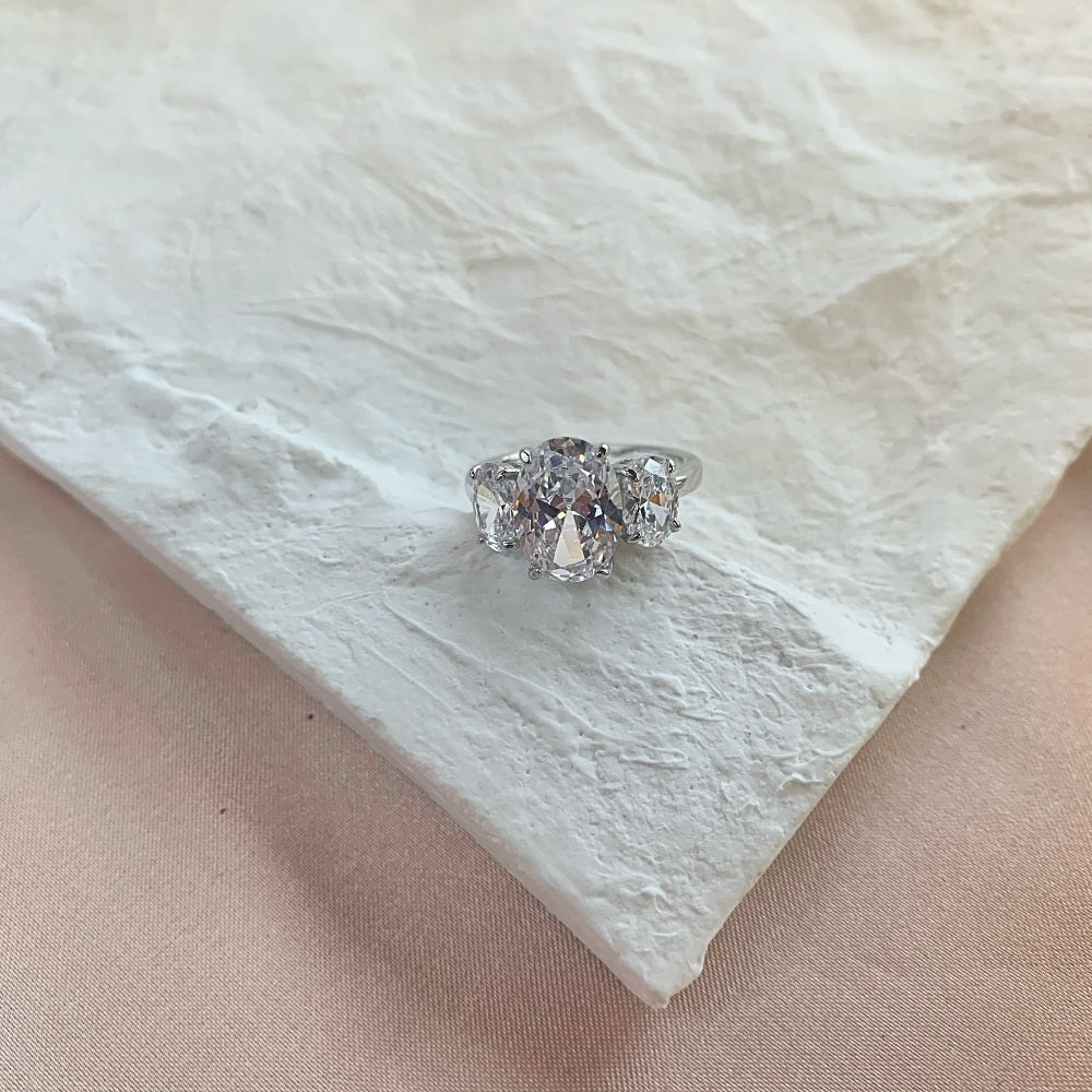 Silver Zircon Oval Cut Inlaid Trilogy Three Stone Ring