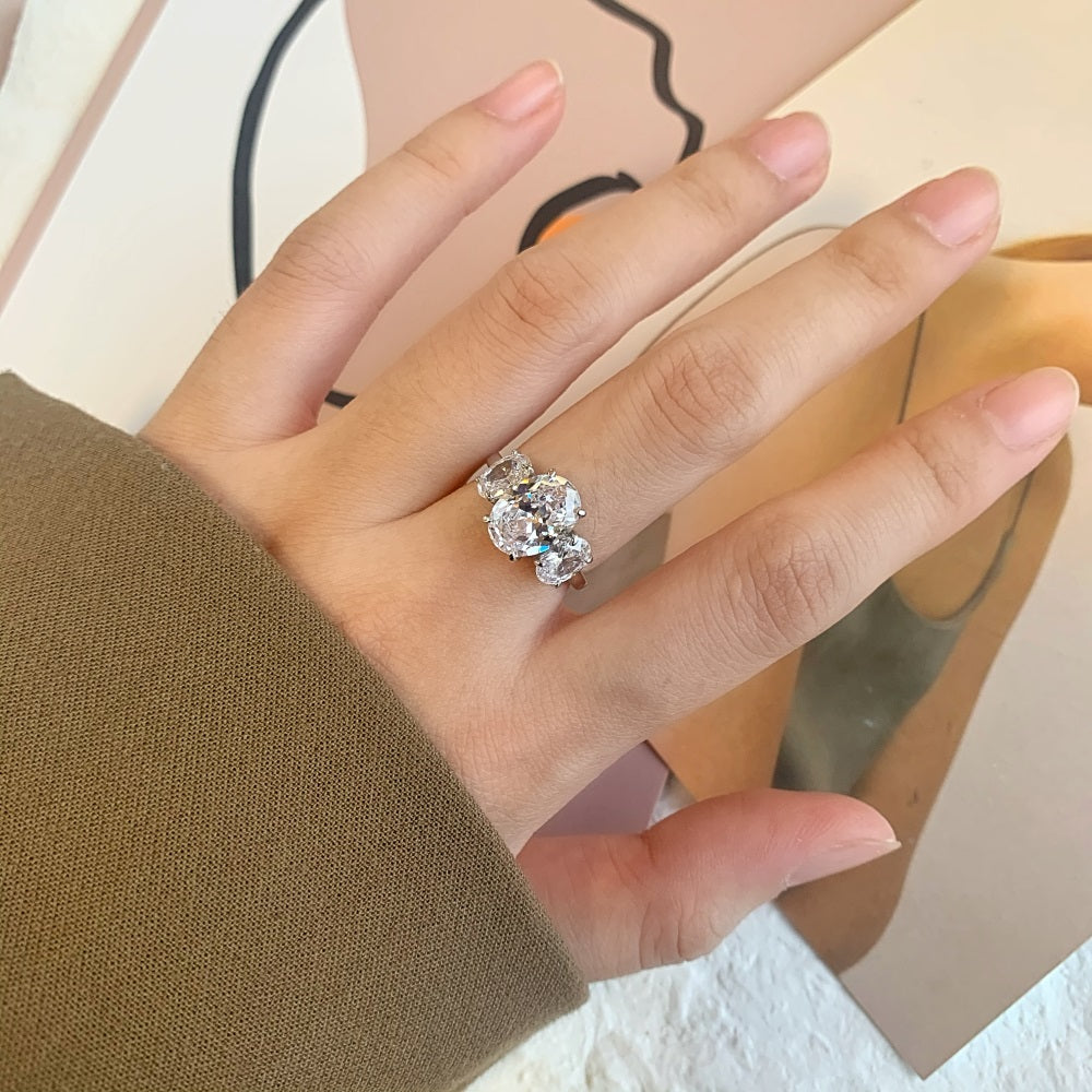 Silver Zircon Oval Cut Inlaid Trilogy Three Stone Ring