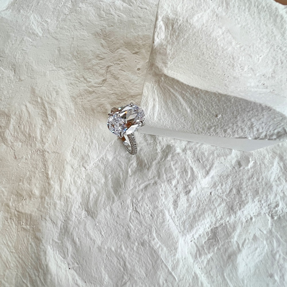 Silver Zircon Oval Cut Iced Solitaire Ring