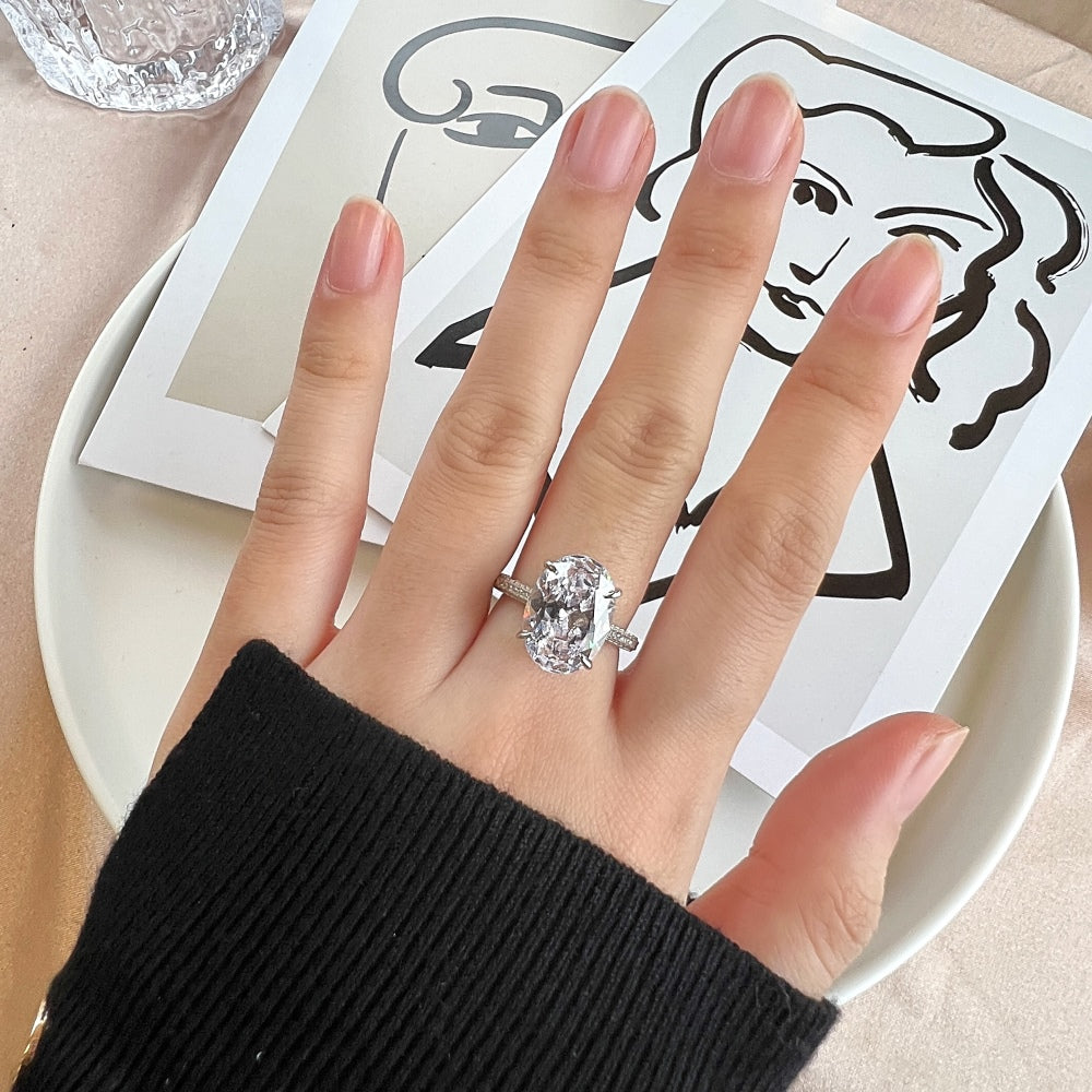 Silver Zircon Oval Cut Iced Solitaire Ring