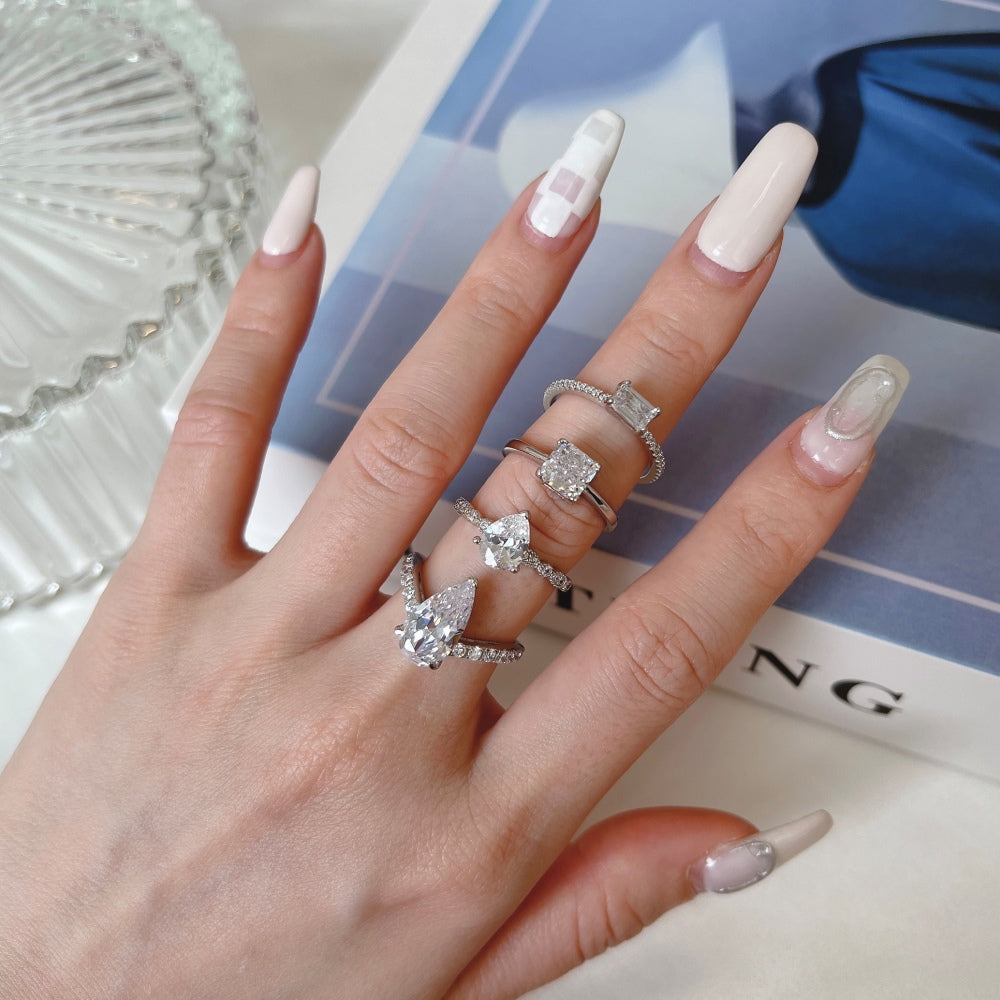 Silver Zircon Emerald Cut Sided Solitaire Ring