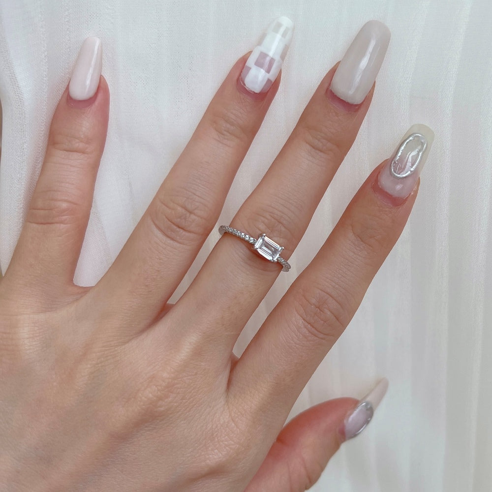 Silver Zircon Emerald Cut Sided Solitaire Ring