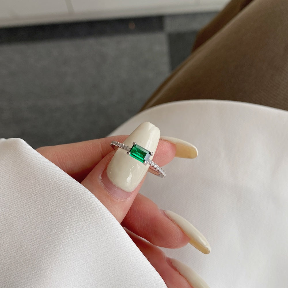 Silver Zircon Emerald Cut Sided Solitaire Ring