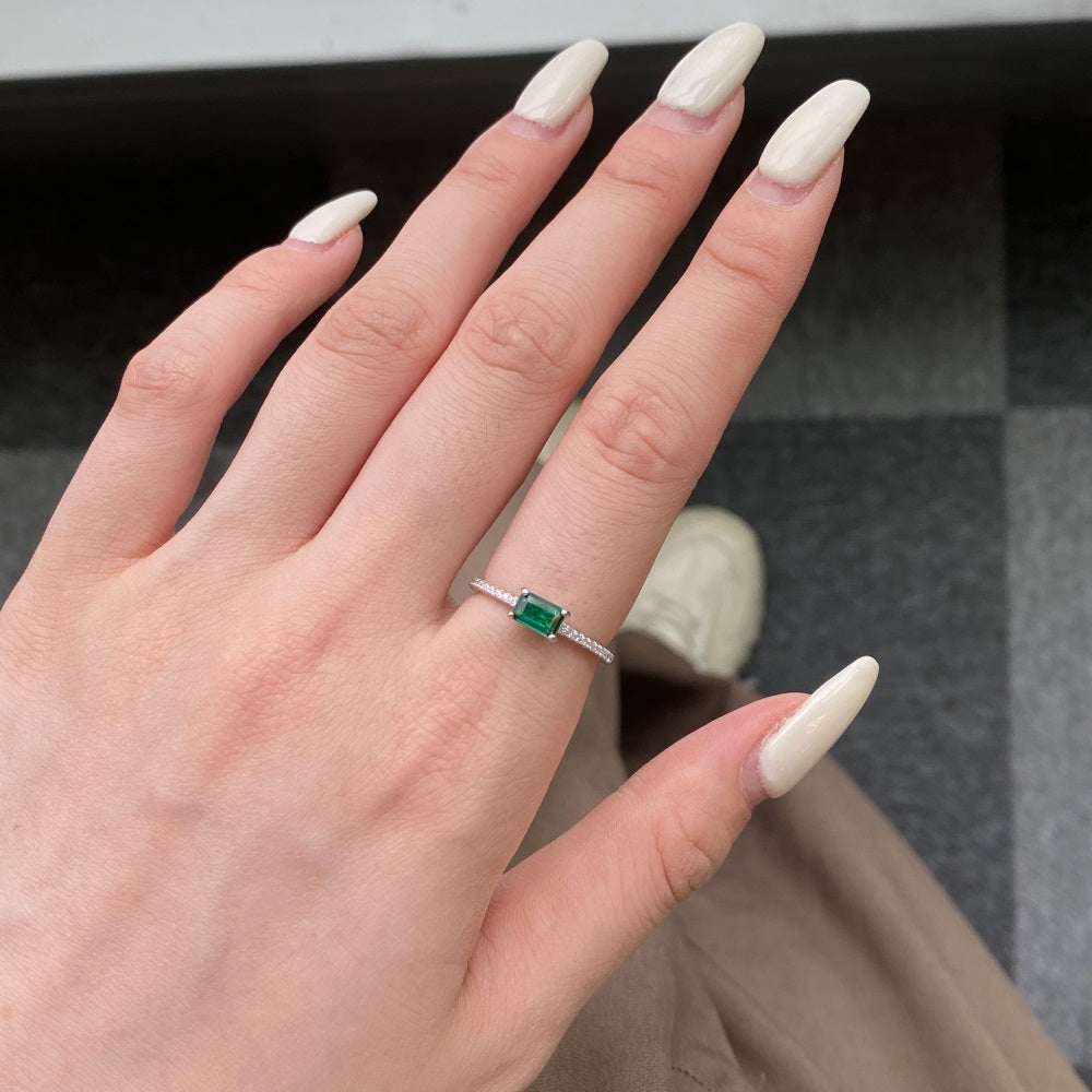 Silver Zircon Emerald Cut Sided Solitaire Ring