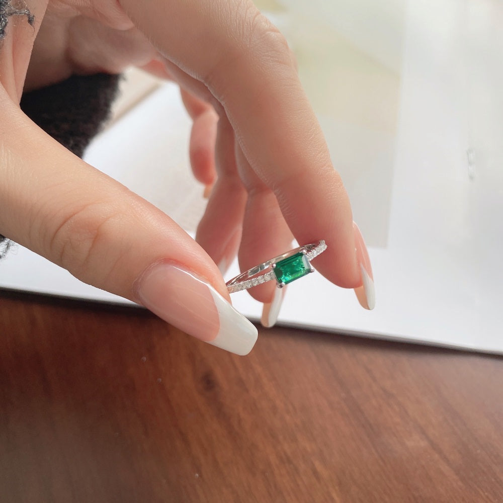 Silver Zircon Emerald Cut Sided Solitaire Ring