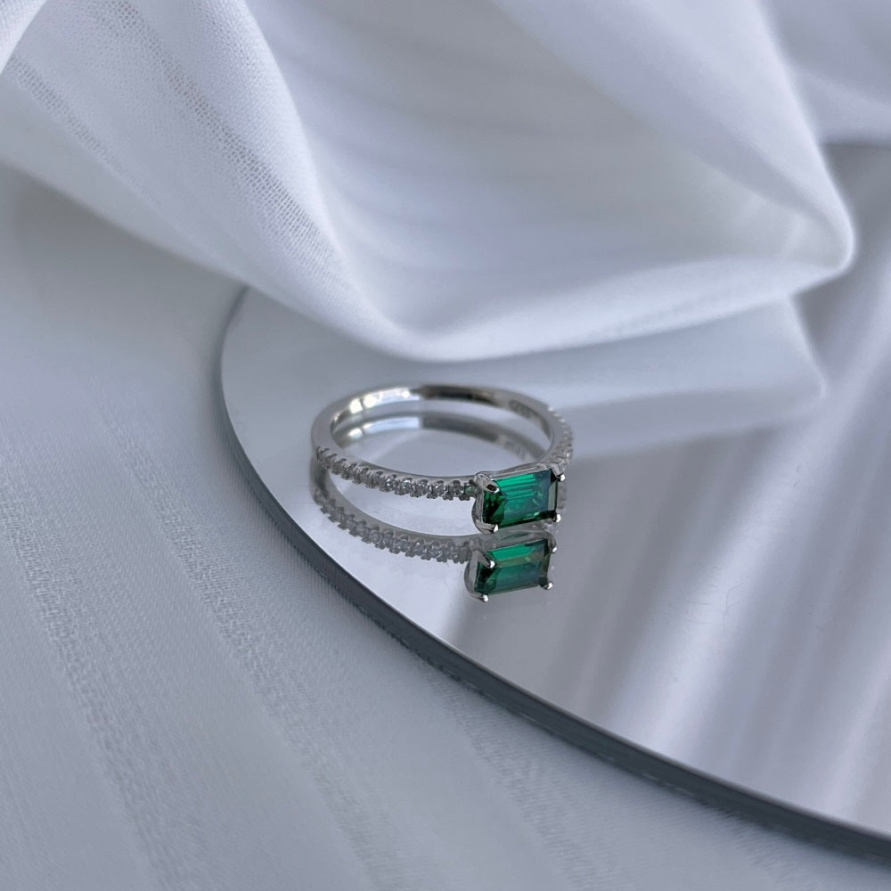 Silver Zircon Emerald Cut Sided Solitaire Ring