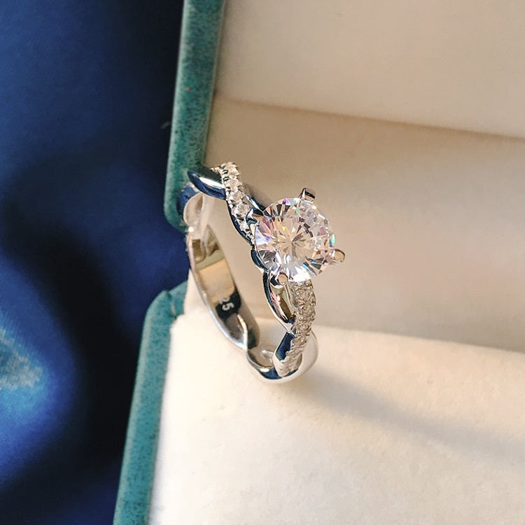 Silver Zircon Round Cut Iced Twisted Solitaire Ring