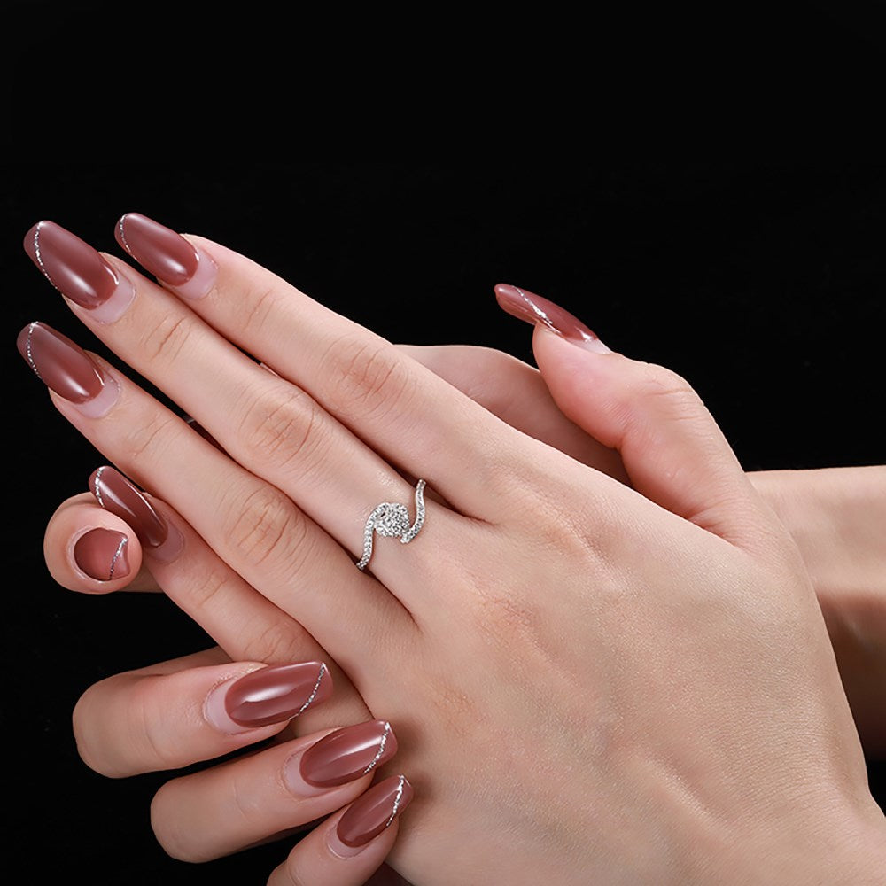 Silver Zircon Round Cut Twisted Iced Heart Bypass Ring