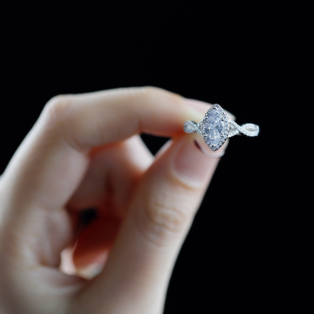 Silver Zircon Marquise Cut Iced Twisted Halo Ring